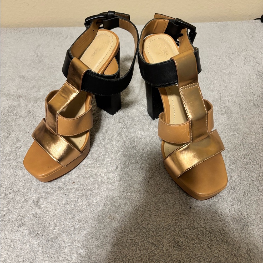 Elizabeth and James Gold and Black Heels
